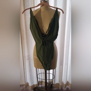 Green swimsuit w/straps in back and front, size 4xl but runs small, w/deep v